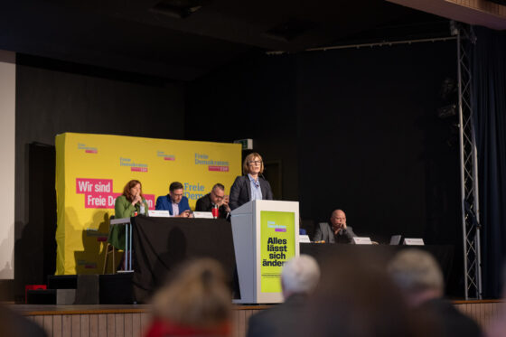 FDP conference with speaker on the podium