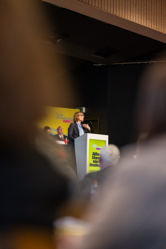 Speaker at the lectern at a political event